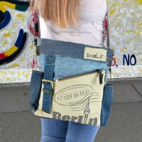 Sunsa Umhängetasche. Crossover Tasche aus recycelte Jeans Canvas & Leder. Große Schultertasche mit Berlin Design